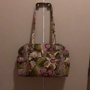 Vera Bradley diaper bag with diaper change mat.